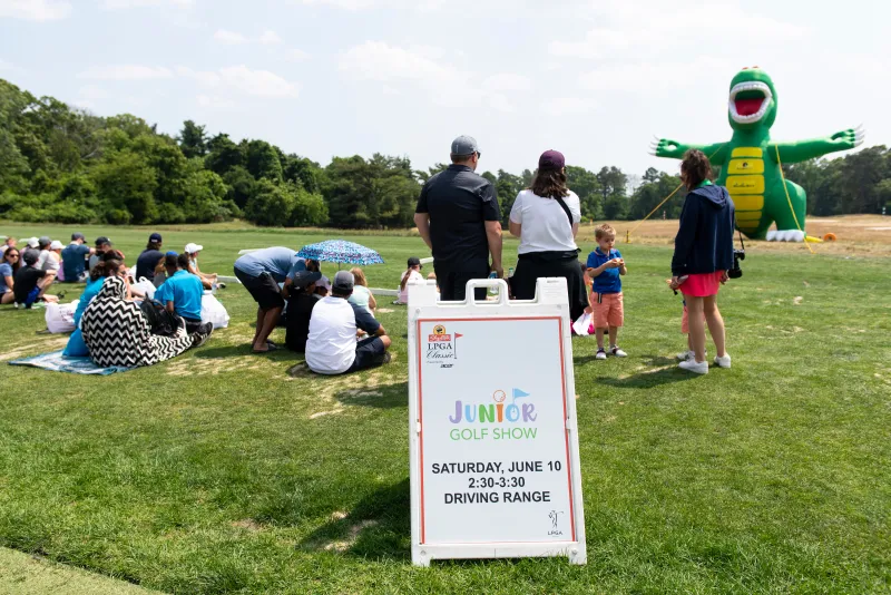 fans gathered on lawn for Junior Golf Show